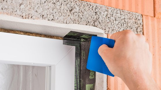 4. Start applying tape at the top of the frame